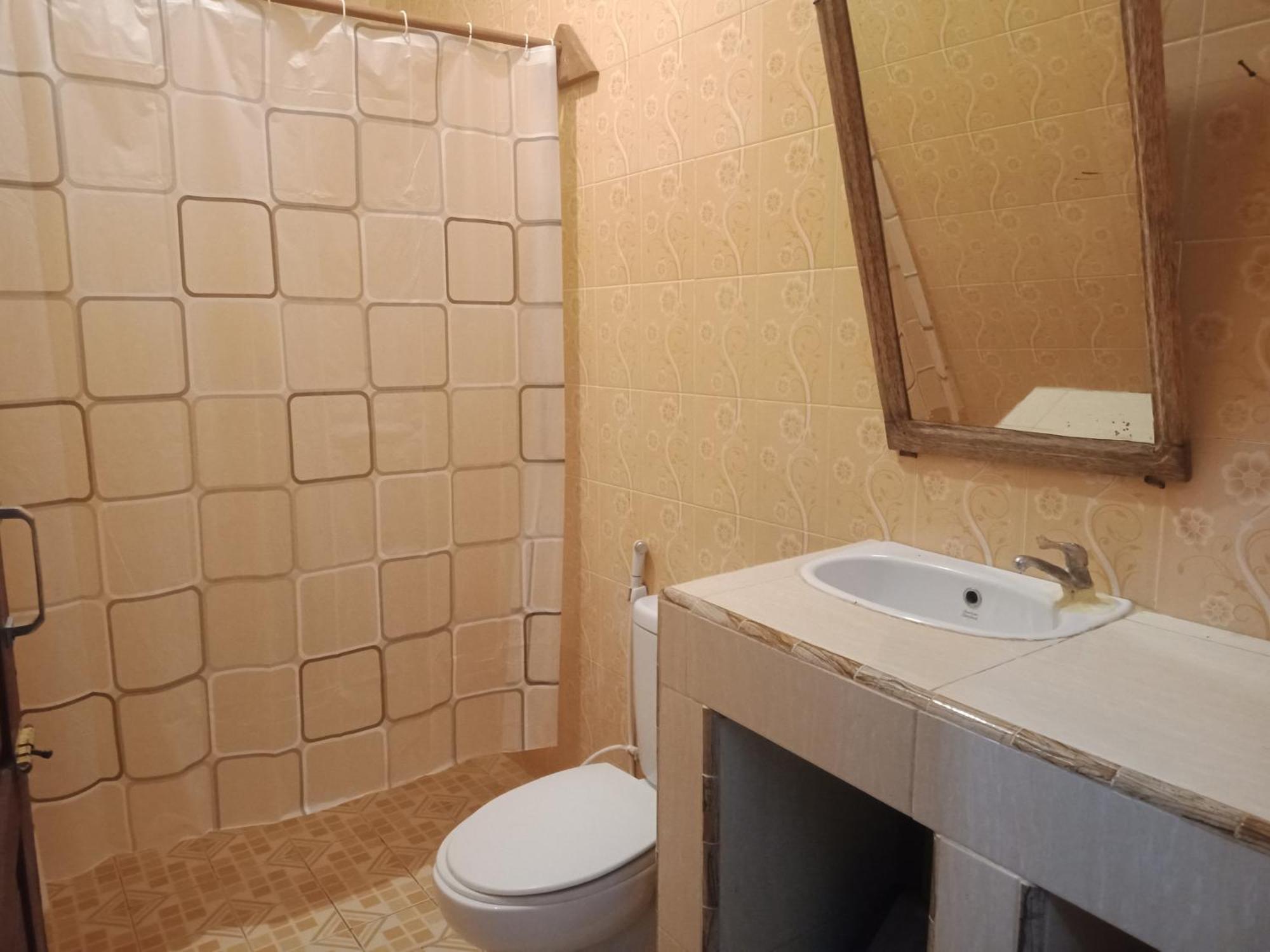 Harus Damai Inn Lagudri Buitenkant foto